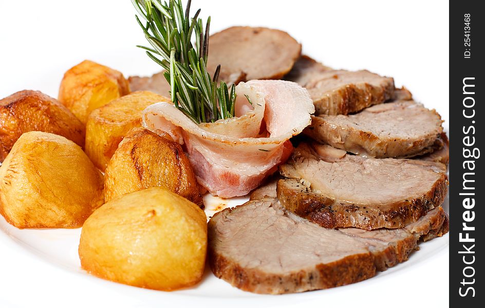 Sliced ​​ham and golden fried potatoes