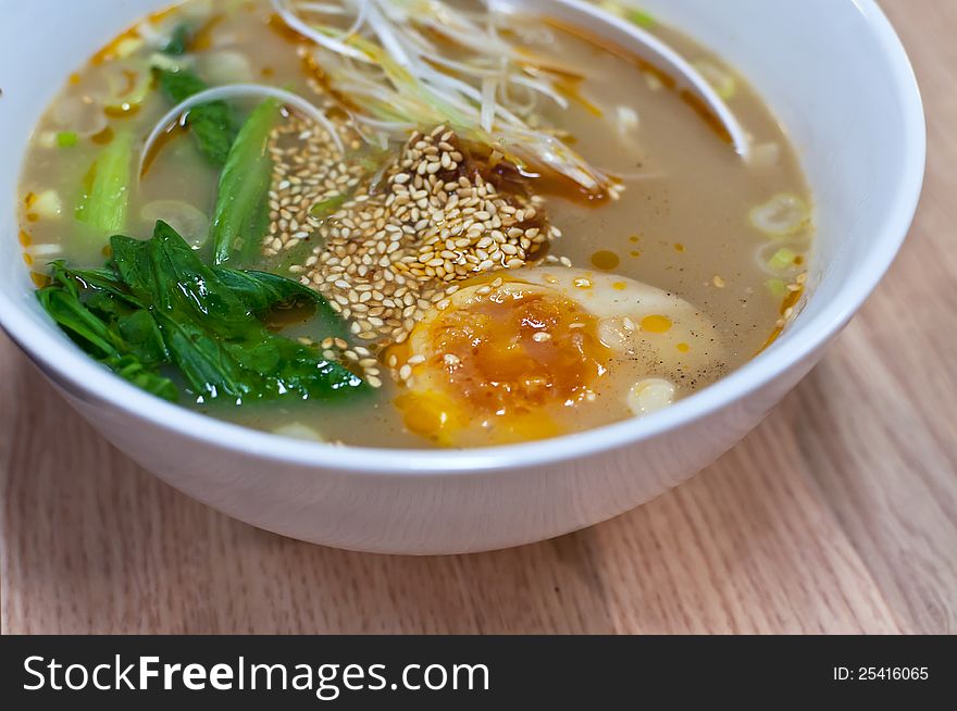 Instant noodles egg. on wood texture you can feel delicious