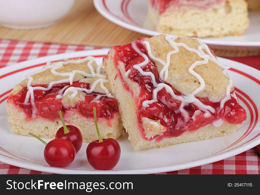 Cherry bars with cherries on a plate. Cherry bars with cherries on a plate
