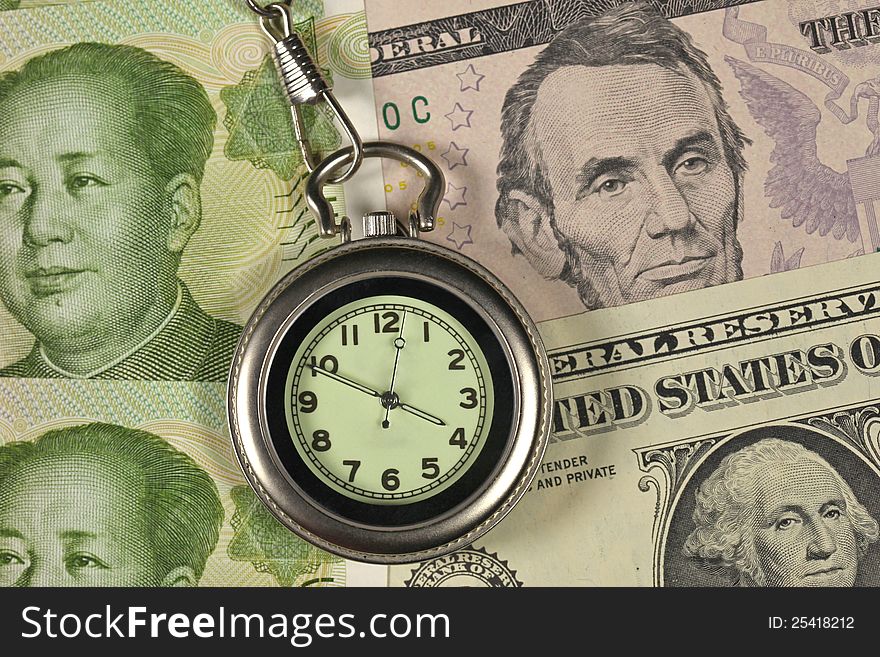 Time and money concept image ( pocket watch and Dollar USA vs RM