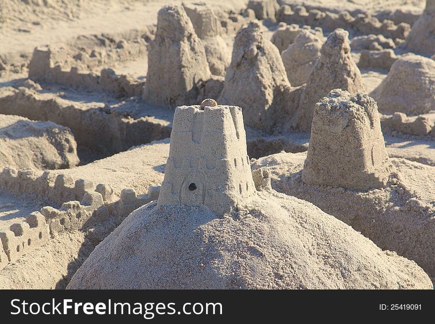 A sand castle in the afternoon sun