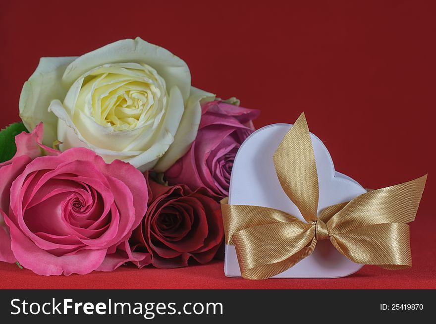 Heart shaped gift box with rose