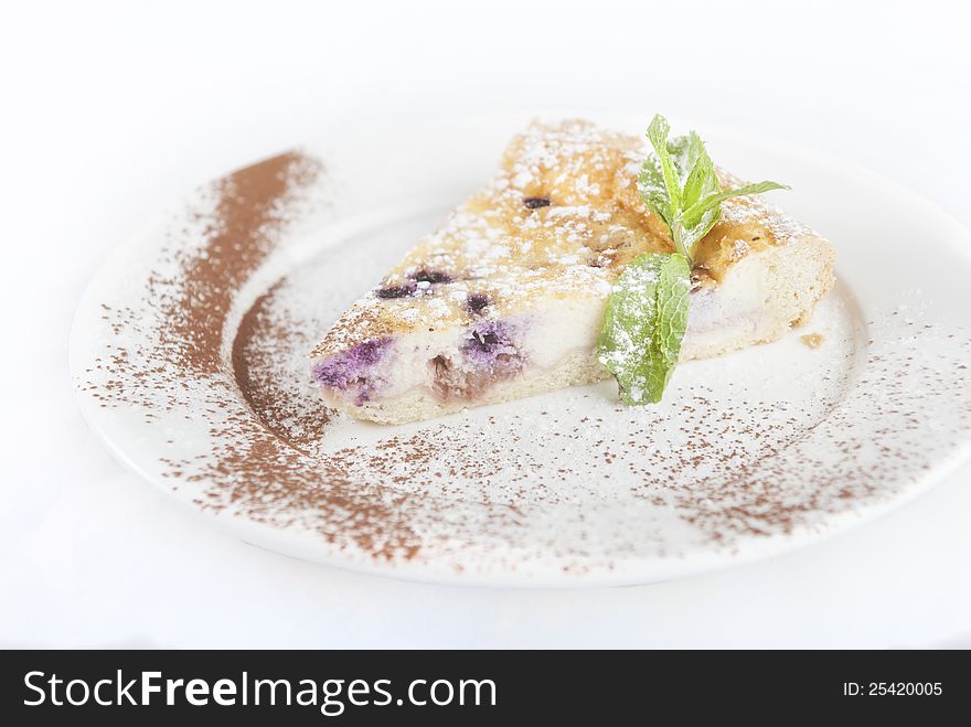 Blueberry cheesecake on a white background