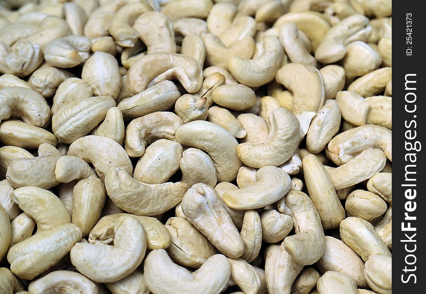 The photo of a set of dried nuts cashew, without a shell.