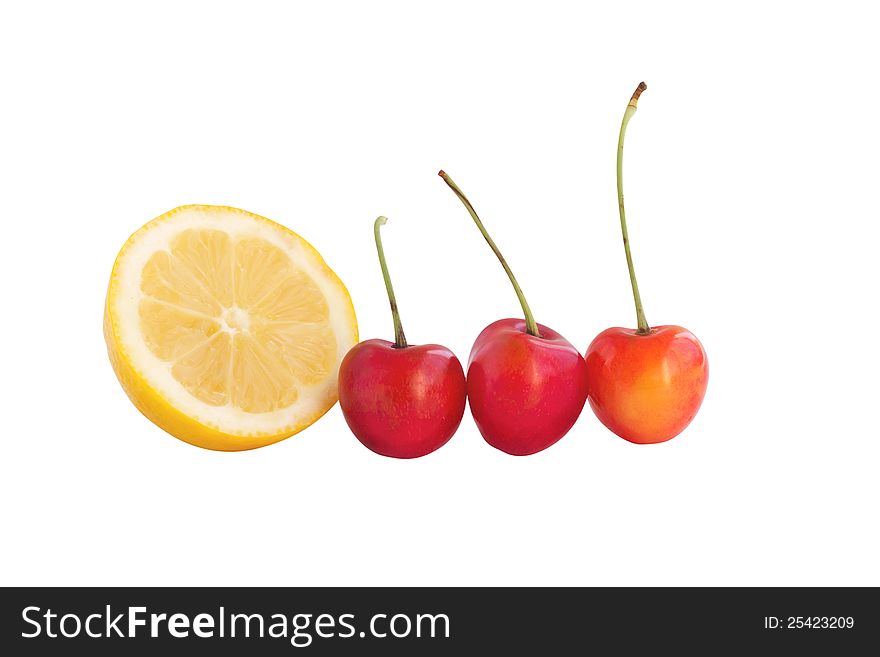 Fresh cherry with lemon isolated on white background. Include clipping path
