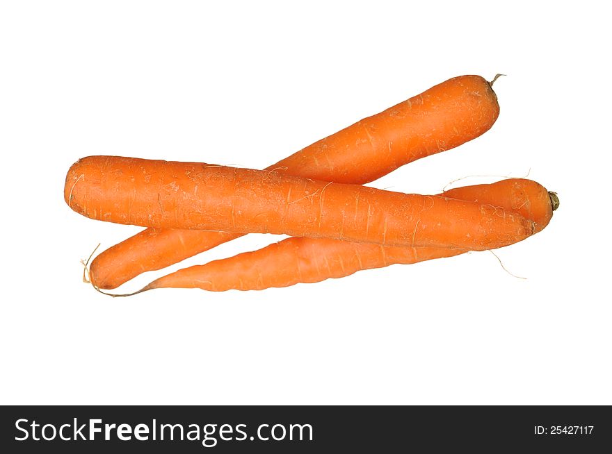 Three ripe carrots isolated on white background