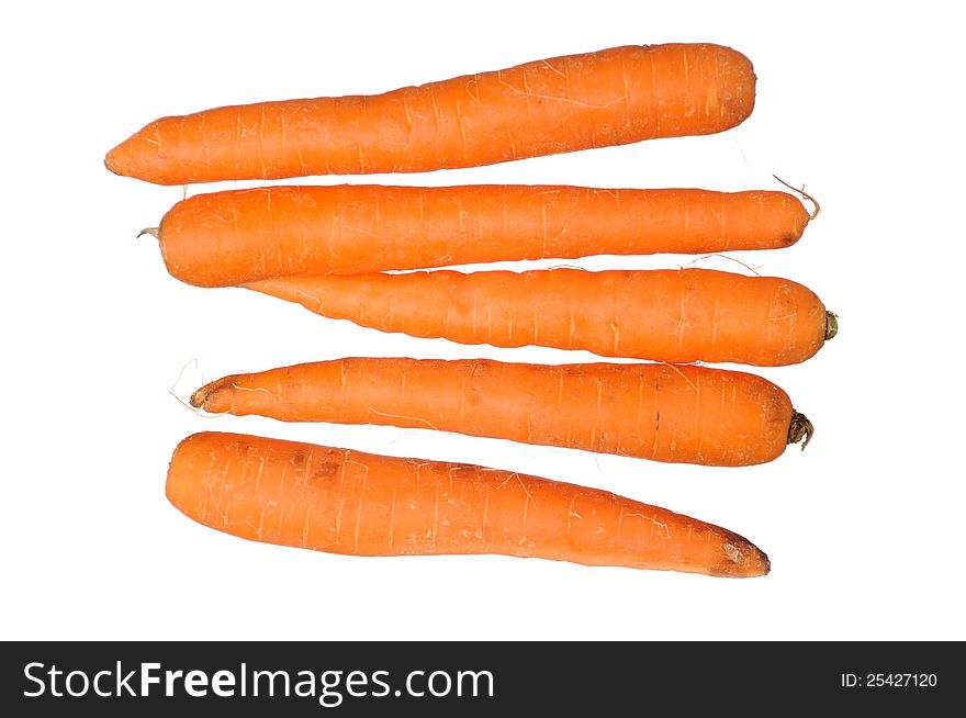Five ripe carrots isolated on white background