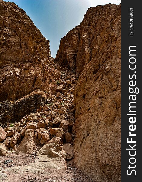 Canyon Of The Yellow Sandy Mountains In The Desert Of Jordan Near The City Of Aqaba, On The Shores Of The Red Sea