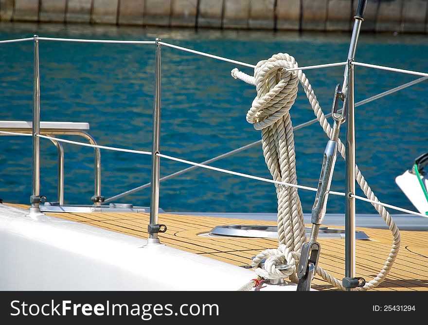 Ropes and knots of sailboat. Tackles on the rigging yacht.
