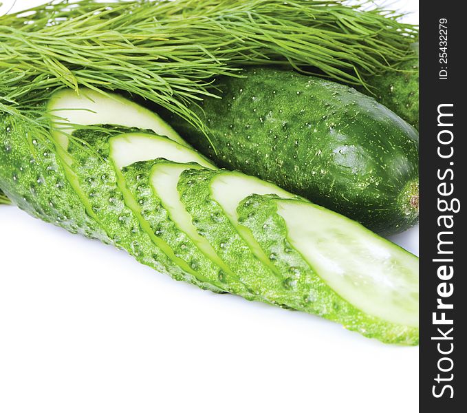 Cucumbers and clove of cucumber, dill on a white background