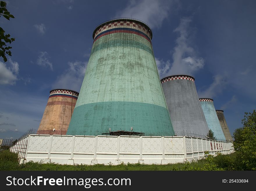 Power station on against the blue sky close up view