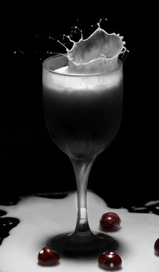 Cherries In Milk Royalty Free Stock Photography