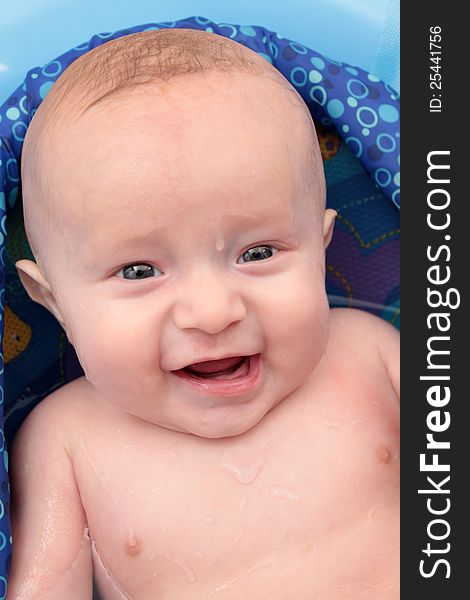 Baby boy having bubble bath for the first time, photo taken at his 5 months.