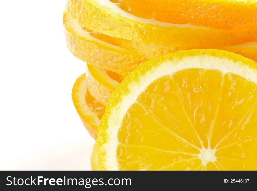 Stack of Sliced juicy fresh oranges closeup frame. Stack of Sliced juicy fresh oranges closeup frame