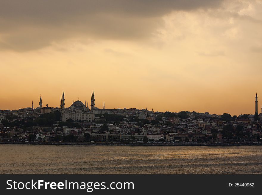 Istanbul and the Blue Mosque seen from the sea at sunset. Istanbul and the Blue Mosque seen from the sea at sunset.