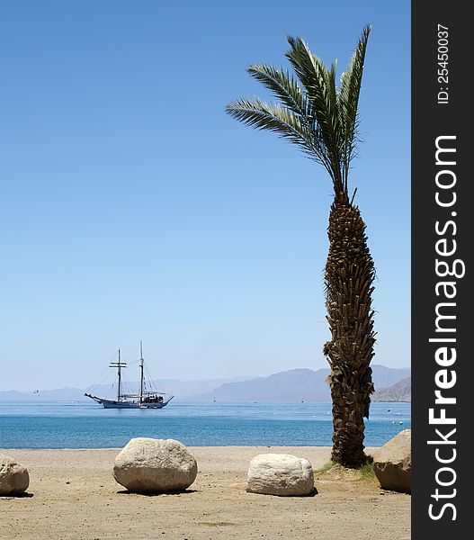 Pleasure yacht near a beach in Eilat - famous resort and recreational city in Israel