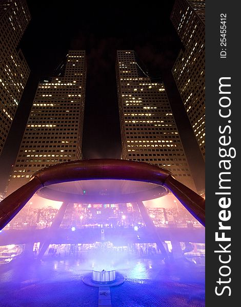 Night shot of Fountain of Wealth, the largest fountain in the world, in Singapore.