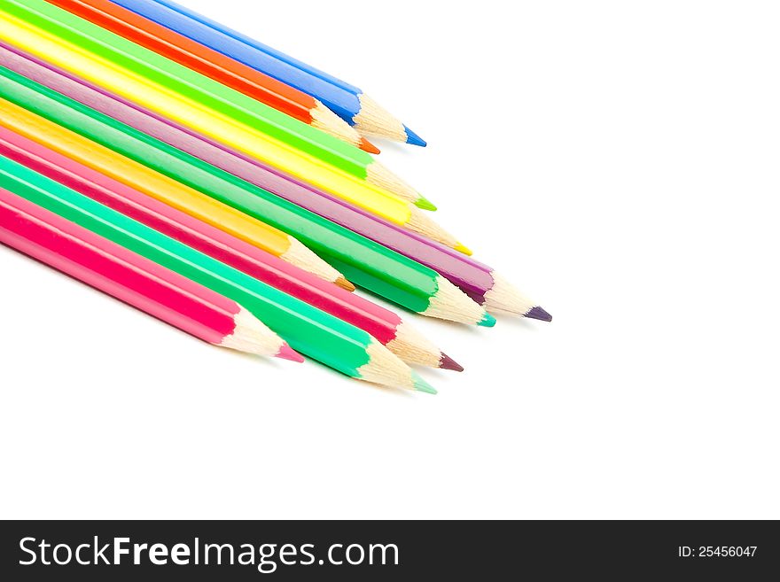 Detail of colour pencils isolated on white background with space for text. Detail of colour pencils isolated on white background with space for text