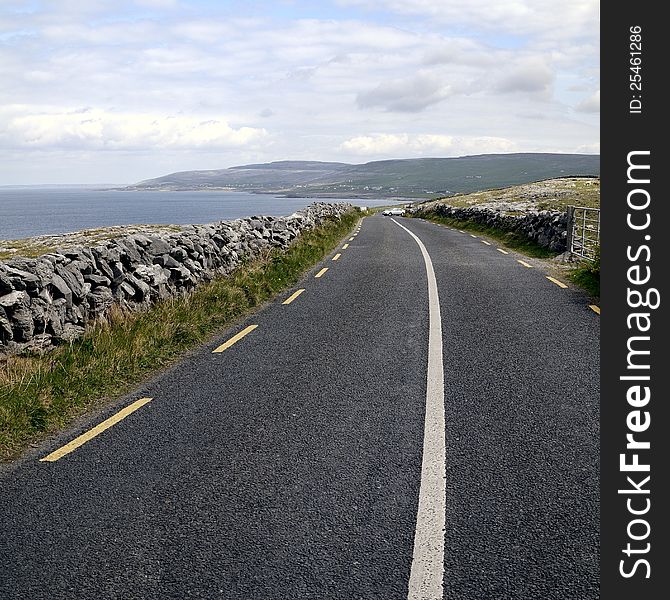 Road. Atlantic coastline, county Clare. The Burren near West Derreen, West Eire. Road. Atlantic coastline, county Clare. The Burren near West Derreen, West Eire