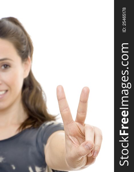 Young Woman Doing Signal Of Victory