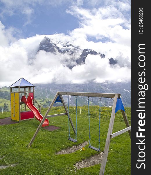 Playground with the breathtaking scenic of Mt.Wetterhorn, Switzerland. Playground with the breathtaking scenic of Mt.Wetterhorn, Switzerland