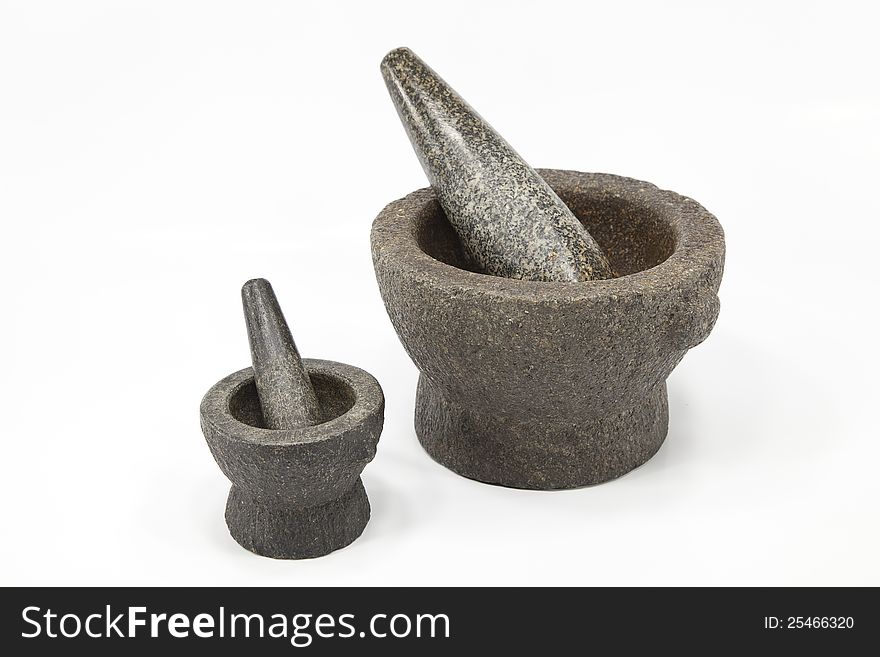 Two sizes of mortar and pestle