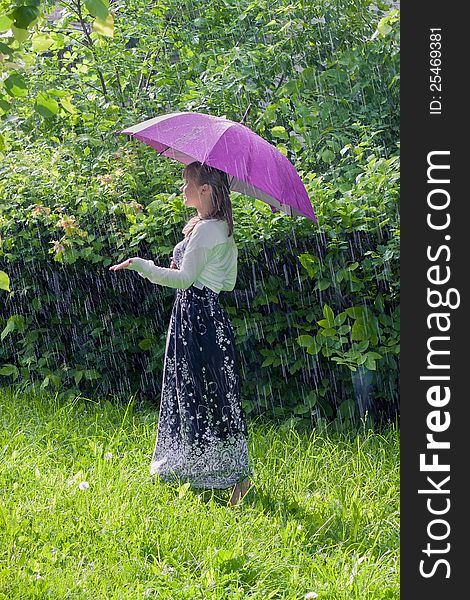 Woman rejoices to rainy weather. Woman rejoices to rainy weather