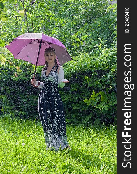 Woman rejoices to rainy weather. Woman rejoices to rainy weather