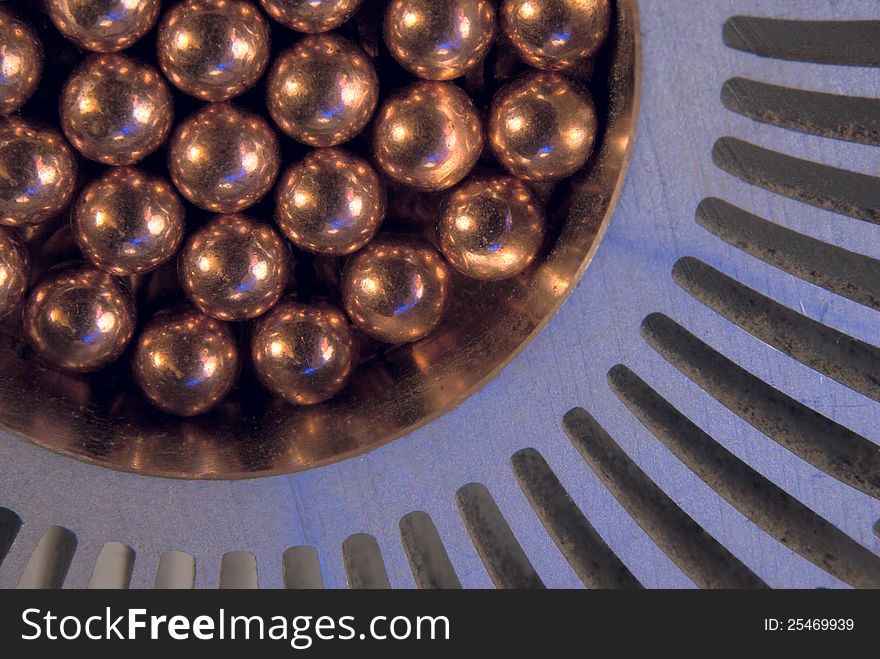 Little golden Metallic Magnetic balls in radiator. Little golden Metallic Magnetic balls in radiator