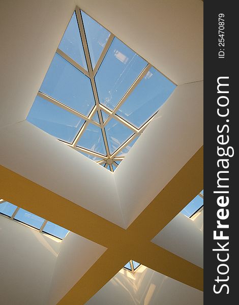 Detail of a hotel roof and window, forming the letter X. Detail of a hotel roof and window, forming the letter X.