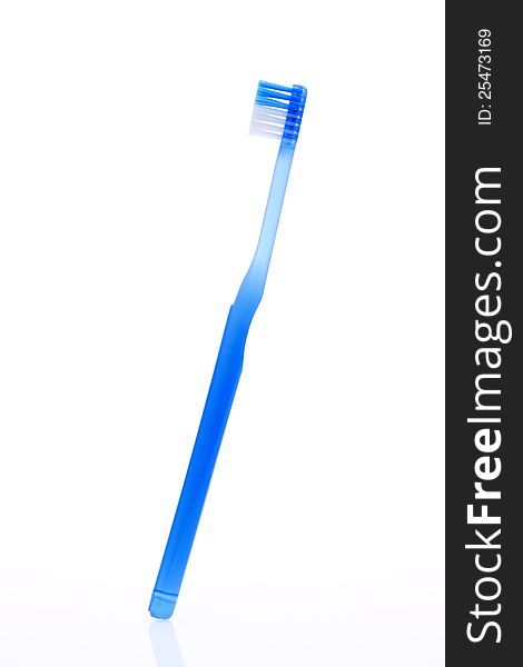 Blue toothbrush on white background