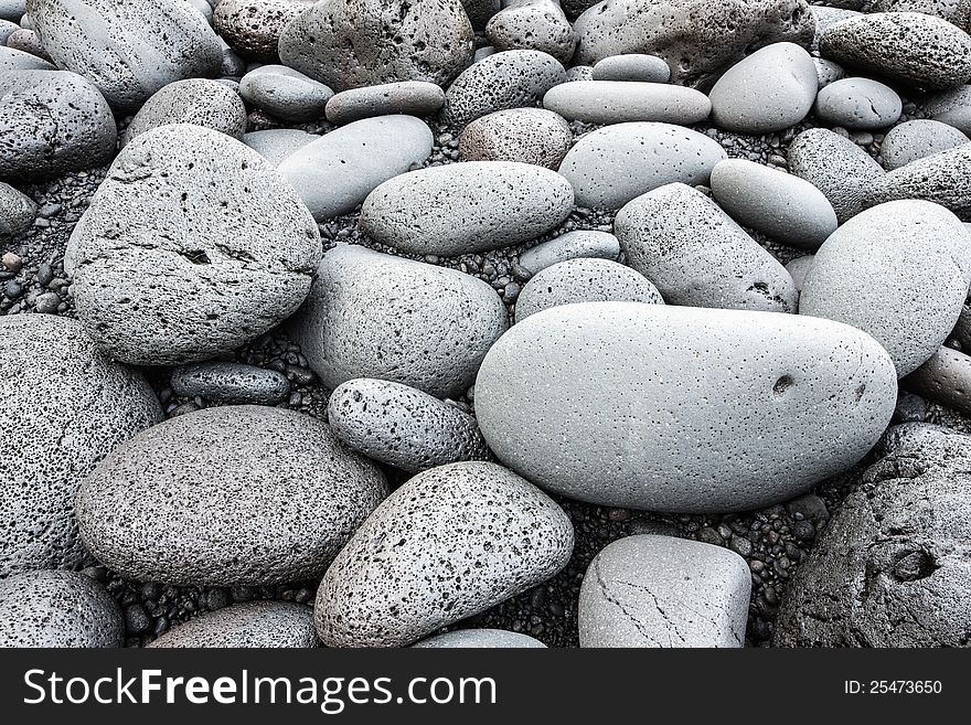 Big pebbles background, shot on a beach in Iceland.