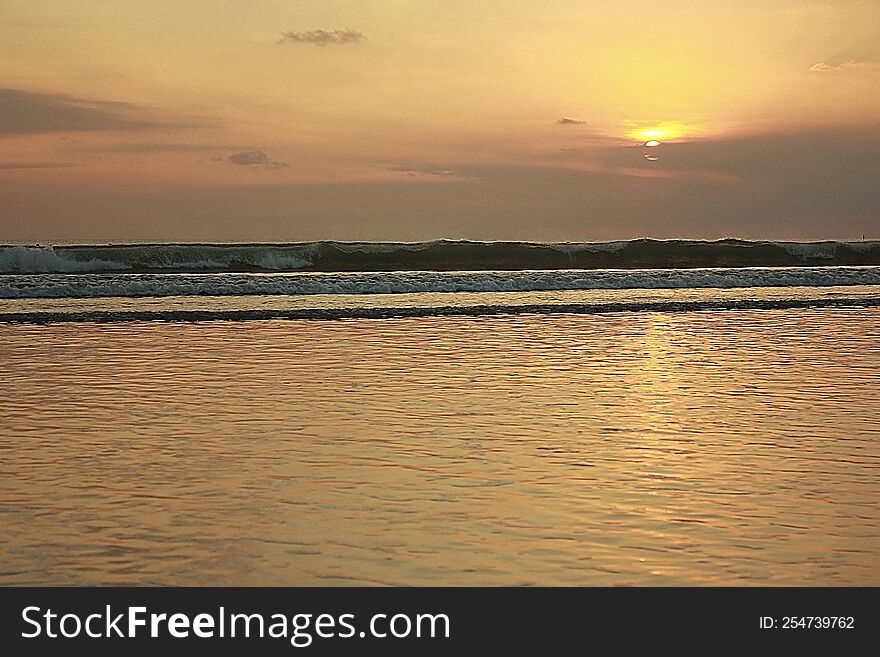 sunset at kuta bali beach, indonesia