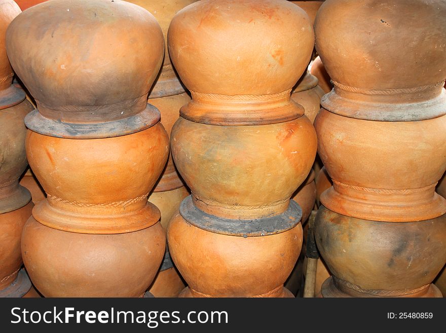 Piles of pottery clay pots in rural Thailand