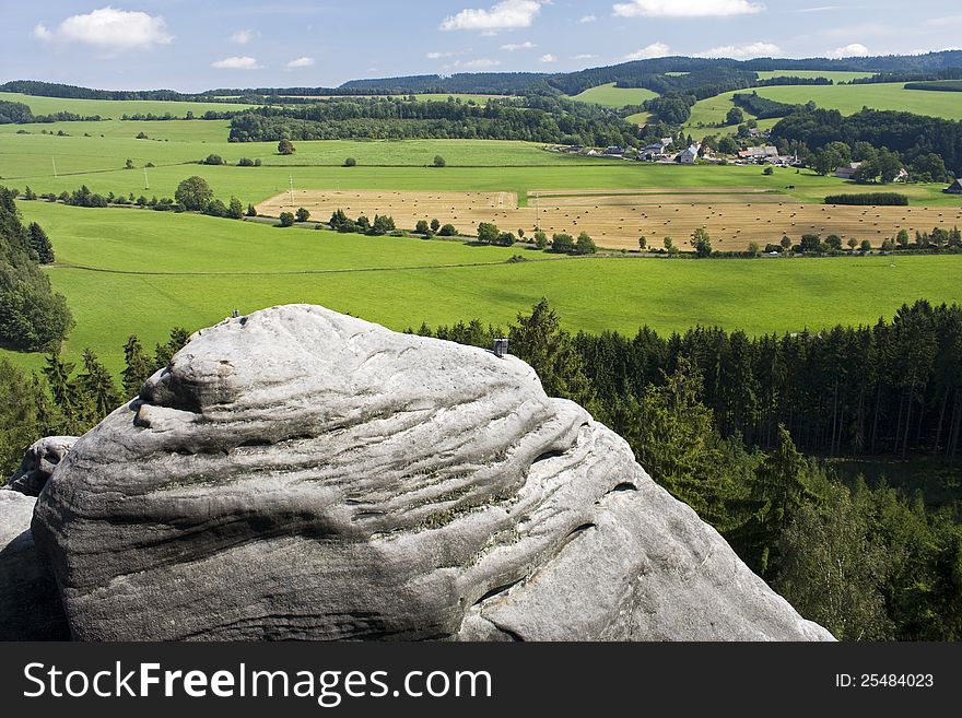 View of rocks on summer agricultural landscape. View of rocks on summer agricultural landscape