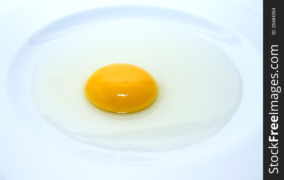 Egg Yolk In The Plate