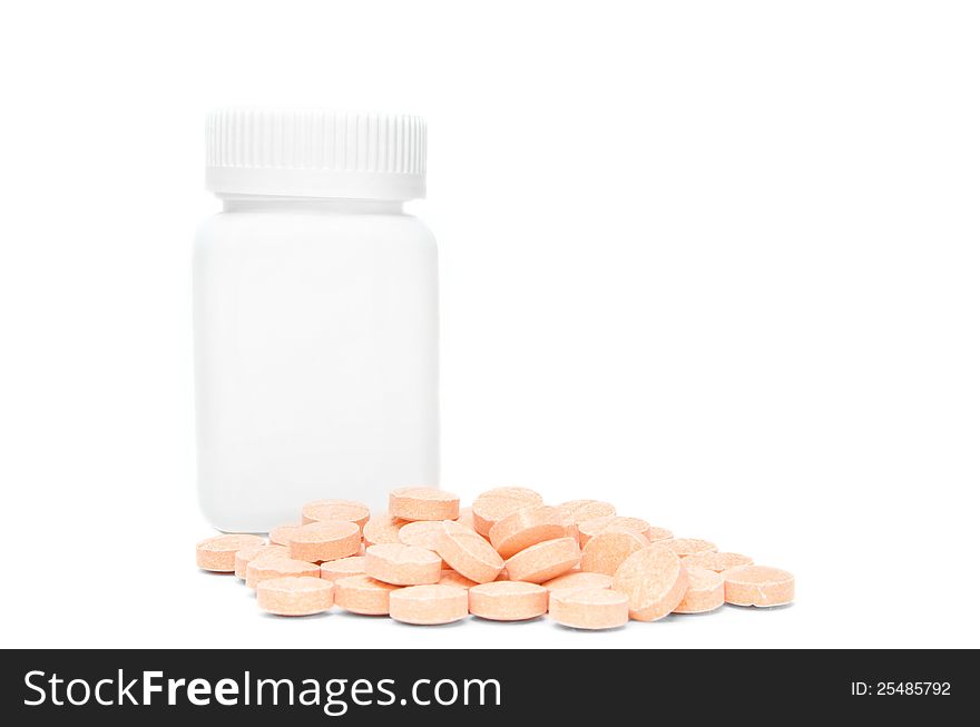 The picture of a bottle and vitamins on white background