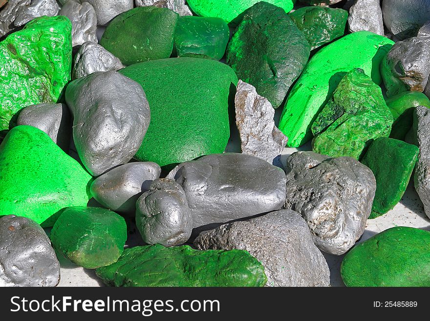 Green and silver stones for garden decoration. Green and silver stones for garden decoration