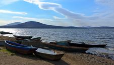 Boats On The Shore Against The Backdrop Of The Lak Royalty Free Stock Photo Boats On The Shore Against The Backdrop Of The Lak Royalty Free Stock Photo