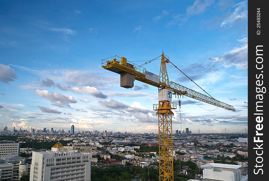 Tower crane on blue sky background