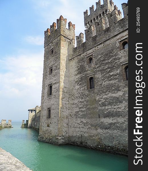 The fortified walls of Sirmione at Lake Garda in Italy. The fortified walls of Sirmione at Lake Garda in Italy