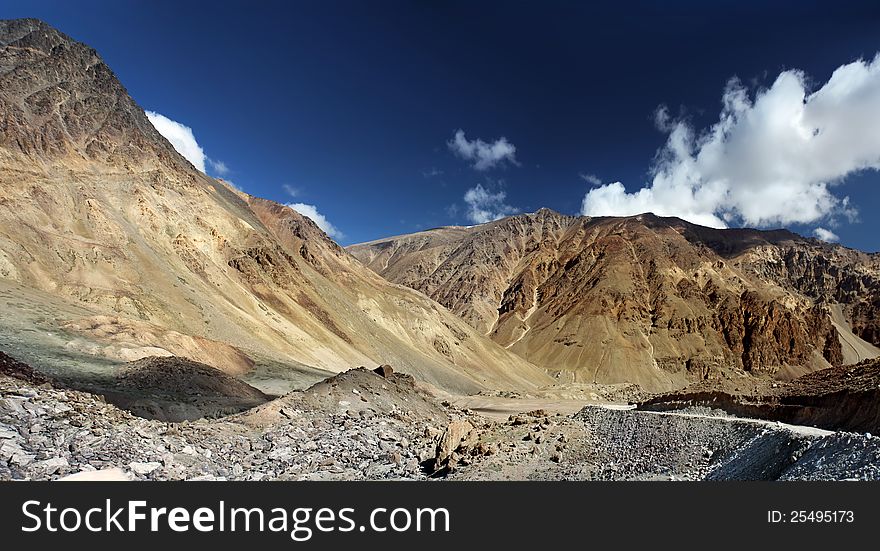 Landscape with mountains and road. The Himalayas. Ladakh. Zanskar. India. Landscape with mountains and road. The Himalayas. Ladakh. Zanskar. India