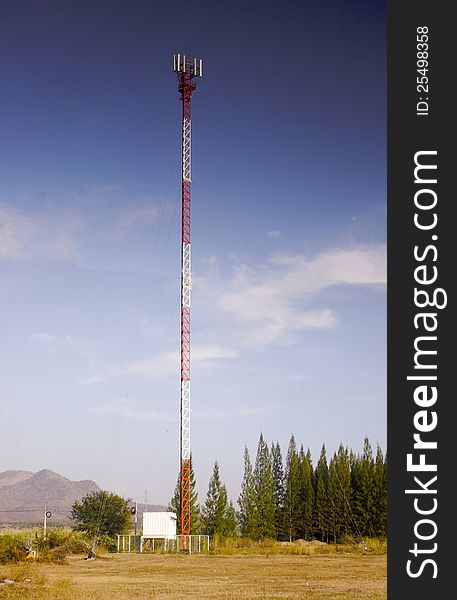 Mobile phone communication antenna tower sky blue