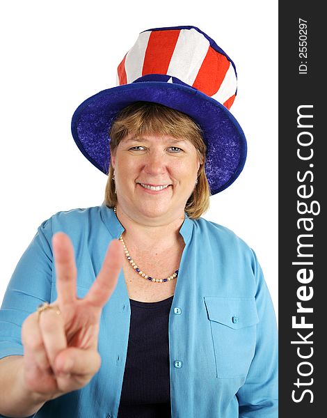 A US military wife wearing a patriotic party hat and flashing a peace sign.  Isolated on white. A US military wife wearing a patriotic party hat and flashing a peace sign.  Isolated on white.