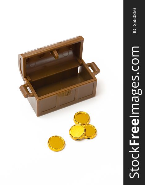 Toy treasure chest with golden coins. Toy treasure chest with golden coins