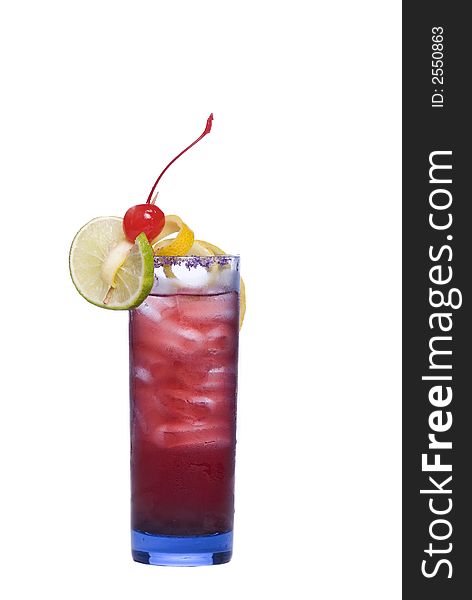 Colorful alcoholic cocktail in a tall glass against white background. Colorful alcoholic cocktail in a tall glass against white background