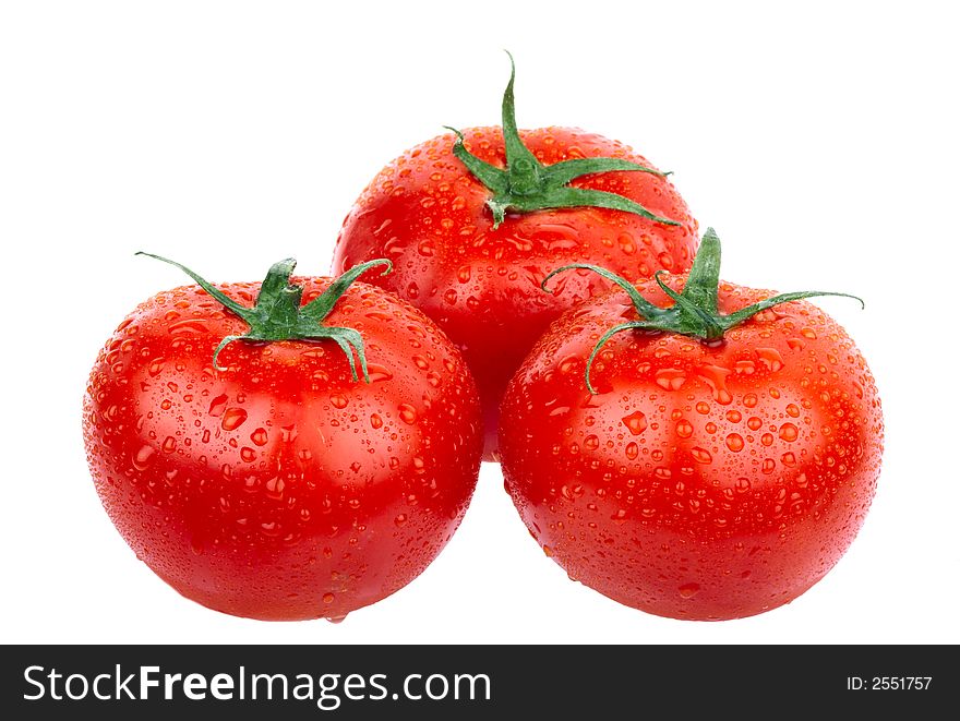 Red tomatoes. Isolated over white background