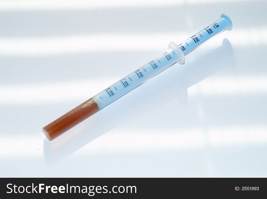 Image with measure syringe with medicines