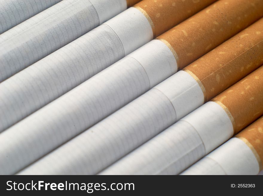 An image of many cigarettes. An image of many cigarettes