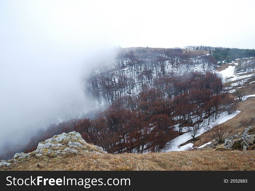 Little fog in brown Crimean mountains. Spring. Little fog in brown Crimean mountains. Spring.